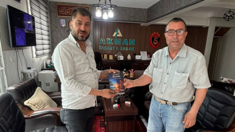 Hakan Akman, Yusuf Mehmet Sarışın'ı iş yerinde ağırladı 